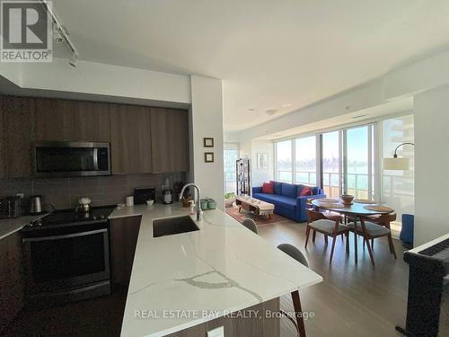 2816 - 30 Shore Breeze Drive, Toronto, ON - Indoor Photo Showing Kitchen With Upgraded Kitchen