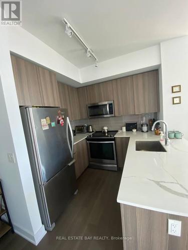 2816 - 30 Shore Breeze Drive, Toronto, ON - Indoor Photo Showing Kitchen With Upgraded Kitchen