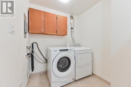 711 - 370 Dixon Road E, Toronto (Kingsview Village-The Westway), ON - Indoor Photo Showing Laundry Room