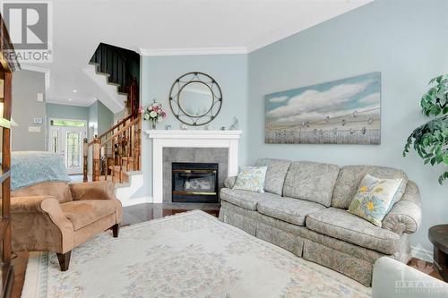 104 Purple Finch Crescent, Ottawa, ON - Indoor Photo Showing Living Room With Fireplace