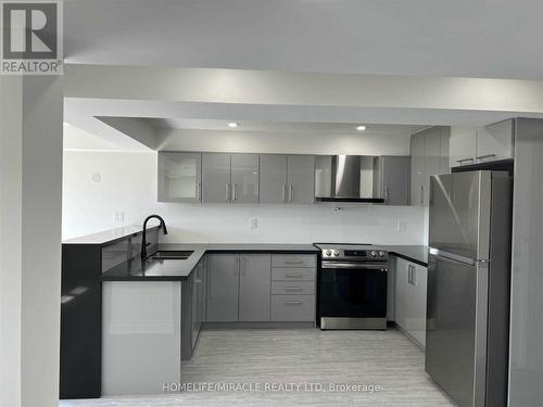 22 Old Cleeve Crescent, Brampton, ON - Indoor Photo Showing Kitchen With Double Sink