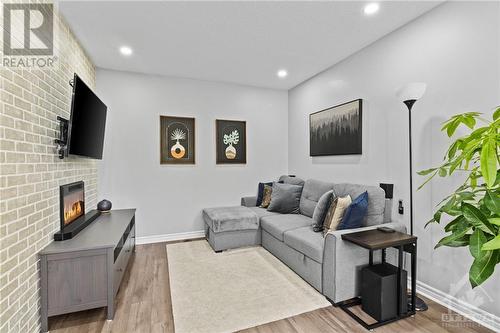 201 Aquilo Crescent, Ottawa, ON - Indoor Photo Showing Living Room With Fireplace