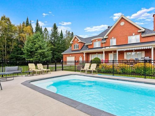 Piscine - 388 Mtée Du Val-De-Loire, Saint-Adolphe-D'Howard, QC - Outdoor With In Ground Pool With Deck Patio Veranda