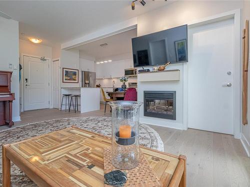 216-1375 Bear Mountain Pkwy, Langford, BC - Indoor Photo Showing Living Room With Fireplace