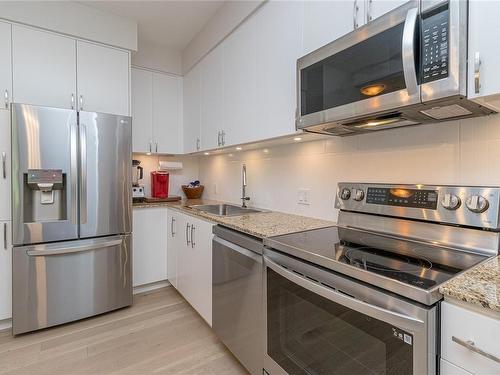 216-1375 Bear Mountain Pkwy, Langford, BC - Indoor Photo Showing Kitchen With Stainless Steel Kitchen With Upgraded Kitchen