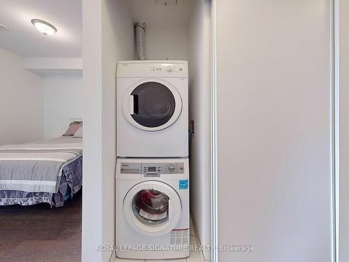 516-57 St Joseph St, Toronto, ON - Indoor Photo Showing Laundry Room