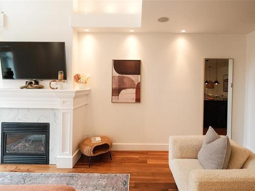 907-1400 Lynburne Pl, Langford, BC - Indoor Photo Showing Living Room With Fireplace