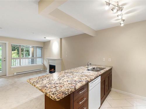 202-5670 Edgewater Lane, Nanaimo, BC - Indoor Photo Showing Kitchen With Double Sink