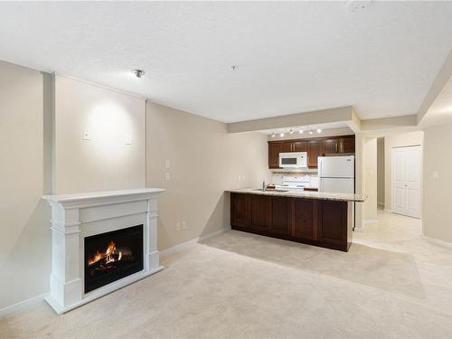 202-5670 Edgewater Lane, Nanaimo, BC - Indoor With Fireplace