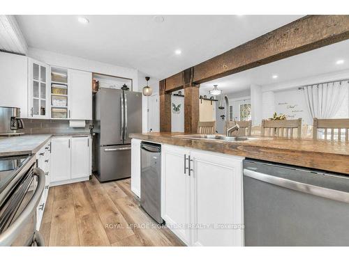 18 Spruyt Ave, East Luther Grand Valley, ON - Indoor Photo Showing Kitchen With Double Sink