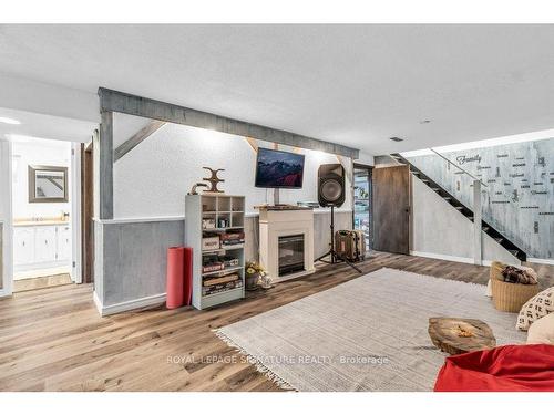 18 Spruyt Ave, East Luther Grand Valley, ON - Indoor Photo Showing Other Room With Fireplace