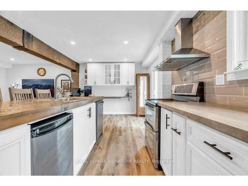 18 Spruyt Ave, East Luther Grand Valley, ON - Indoor Photo Showing Kitchen With Double Sink