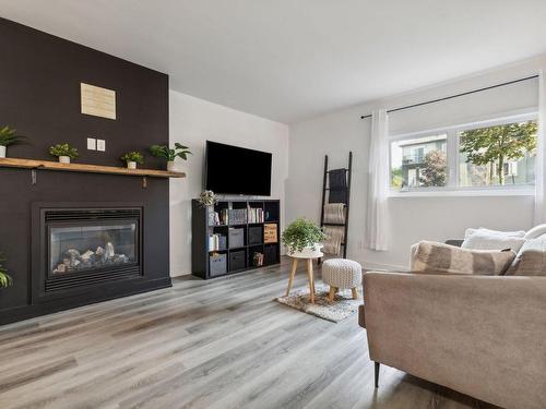 Living room - 1-1693 Boul. St-René E., Gatineau (Gatineau), QC - Indoor Photo Showing Living Room With Fireplace