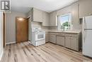 1410 Cumberland Avenue S, Saskatoon, SK  - Indoor Photo Showing Kitchen With Double Sink 