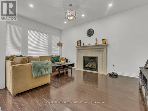 19 Kilkarrin Road, Brampton, ON - Indoor Photo Showing Living Room With Fireplace