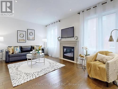 61 Bush Ridges Avenue, Richmond Hill, ON - Indoor Photo Showing Living Room With Fireplace