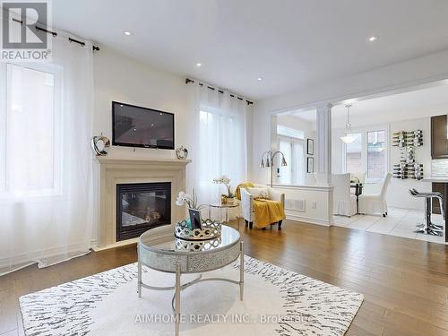 61 Bush Ridges Avenue, Richmond Hill, ON - Indoor Photo Showing Living Room With Fireplace