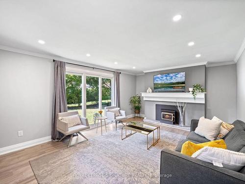 9 Caledon Crt, Brampton, ON - Indoor Photo Showing Living Room With Fireplace