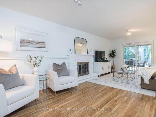 7237 Bendigo Circ, Mississauga, ON - Indoor Photo Showing Living Room With Fireplace