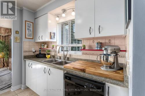 708 - 358 Waterloo Avenue S, Guelph, ON - Indoor Photo Showing Kitchen With Double Sink