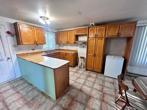 Cuisine - 1340 Rue Mirelle, Laval (Saint-François), QC - Indoor Photo Showing Kitchen With Double Sink