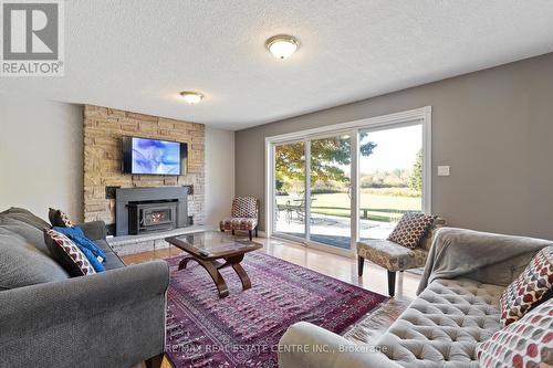 5188 Highway 26 Freeway, Clearview, ON - Indoor Photo Showing Living Room With Fireplace