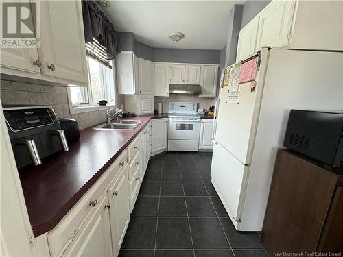 24 Rue Deschênes, Saint-Quentin, NB - Indoor Photo Showing Kitchen With Double Sink