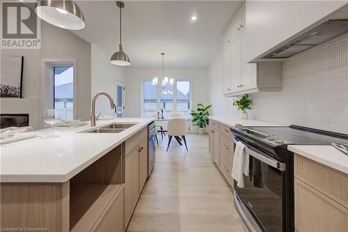 19 Carriage Crossing, Drayton, ON - Indoor Photo Showing Kitchen With Double Sink With Upgraded Kitchen