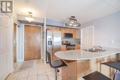 807 - 1720 Eglington Avenue E, Toronto, ON - Indoor Photo Showing Kitchen With Double Sink