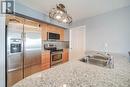 807 - 1720 Eglington Avenue E, Toronto, ON  - Indoor Photo Showing Kitchen With Double Sink 