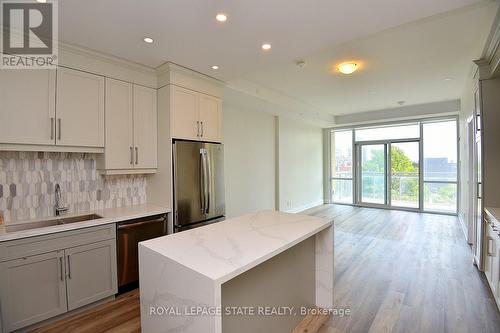 704 - 2025 Maria Street, Burlington, ON - Indoor Photo Showing Kitchen With Upgraded Kitchen