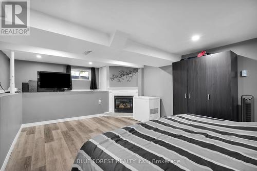 181 Mcconnell Street, South Huron (Exeter), ON - Indoor Photo Showing Bedroom With Fireplace