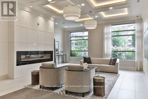 1806 - 25 Fontenay Court, Toronto, ON - Indoor With Fireplace