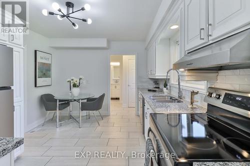 3469 Rockwood Drive, Burlington (Roseland), ON - Indoor Photo Showing Kitchen With Double Sink