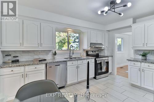 3469 Rockwood Drive, Burlington (Roseland), ON - Indoor Photo Showing Kitchen With Double Sink