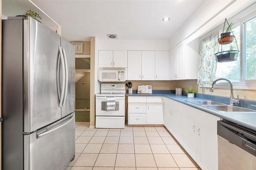 26 West Avenue, Winnipeg, MB - Indoor Photo Showing Kitchen With Double Sink