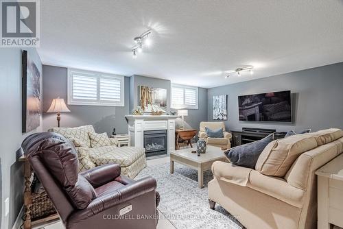 55 - 2250 Buroak Drive, London, ON - Indoor Photo Showing Living Room With Fireplace