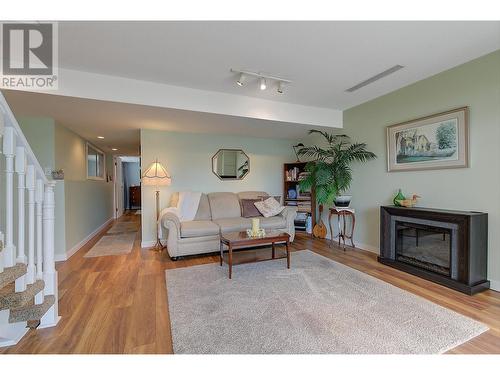 6050 Beatrice Road, Peachland, BC - Indoor Photo Showing Living Room With Fireplace