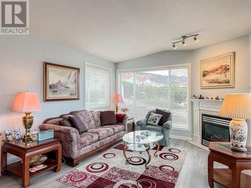 9400 115Th Street Unit# 53, Osoyoos, BC - Indoor Photo Showing Living Room With Fireplace