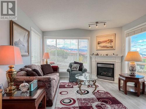 9400 115Th Street Unit# 53, Osoyoos, BC - Indoor Photo Showing Living Room With Fireplace