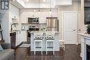 E403 - 52 Coles Avenue, Vaughan, ON  - Indoor Photo Showing Kitchen With Stainless Steel Kitchen With Upgraded Kitchen 