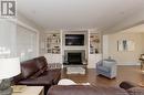 485 Broussard, Dieppe, NB  - Indoor Photo Showing Living Room With Fireplace 