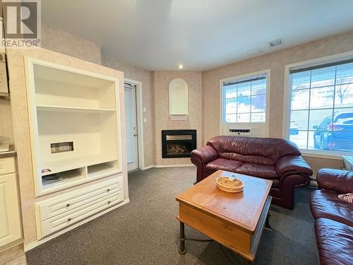 5052 Riverview Road Unit# 4006B, Fairmont Hot Springs, BC - Indoor Photo Showing Living Room With Fireplace