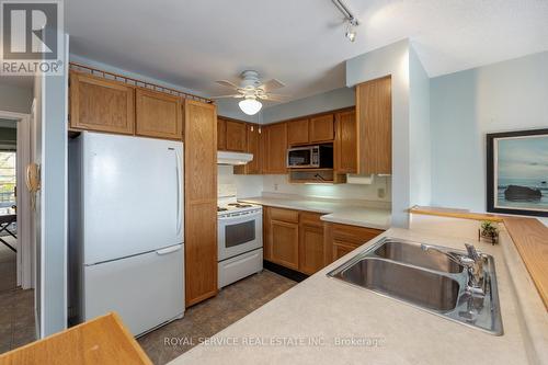 A205 - 182 D'Arcy Street, Cobourg, ON - Indoor Photo Showing Kitchen With Double Sink