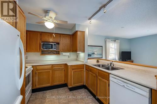 A205 - 182 D'Arcy Street, Cobourg, ON - Indoor Photo Showing Kitchen With Double Sink