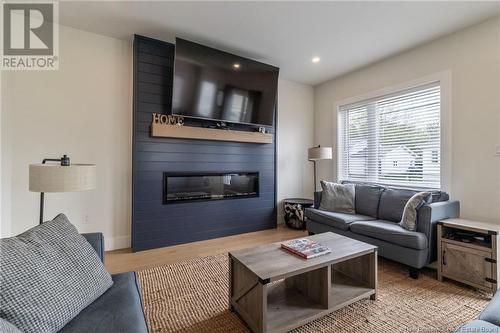 3 Heros Court, Moncton, NB - Indoor Photo Showing Living Room With Fireplace