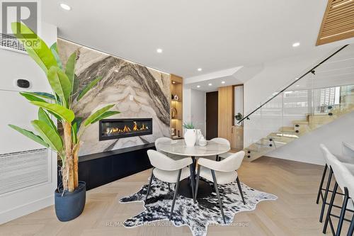 602 - 55A Avenue Road, Toronto, ON - Indoor Photo Showing Dining Room With Fireplace