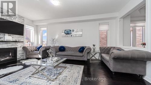 22 Exhibition Crescent, Brampton, ON - Indoor Photo Showing Living Room With Fireplace