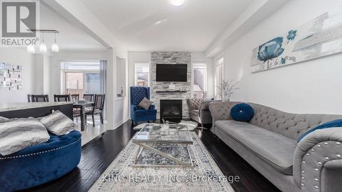 22 Exhibition Crescent, Brampton, ON - Indoor Photo Showing Living Room With Fireplace