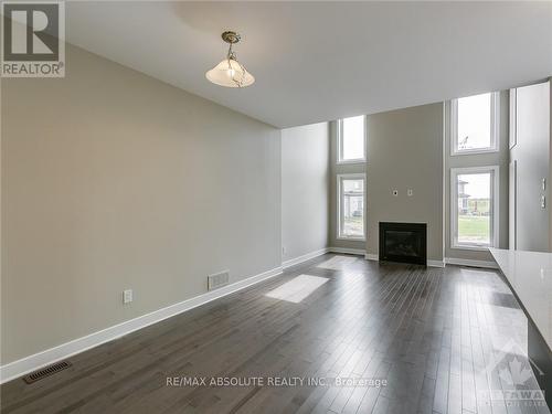 4952 Abbott Street E, Ottawa, ON - Indoor Photo Showing Living Room With Fireplace